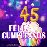 GIF animado de un cupcake decorado con confites, dos velas doradas encendidas formando el número 45, sobre un fondo púrpura brillante con destellos.
