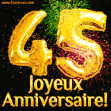 GIF animé pour un 45e anniversaire avec des ballons dorés en forme de 45, des feux d'artifice colorés et le texte 'Joyeux Anniversaire!' sur un fond noir festif.