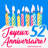 GIF animé joyeux anniversaire pour 52 ans avec des bougies colorées allumées, un fond bleu vif et le texte 'Joyeux Anniversaire 52!' en écriture élégante.
