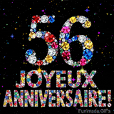 Image animée affichant le chiffre 56 et Joyeux Anniversaire en cristaux multicolores scintillants, entourés de petites lumières sur fond sombre.