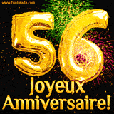 GIF animé pour un 56e anniversaire avec des ballons dorés en forme de 56, des feux d'artifice colorés et le texte 'Joyeux Anniversaire!' sur un fond noir festif.
