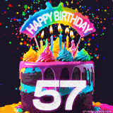Chocolate cake with cyan layers, pink dressing and a big number 57 adorned with vibrant multicolored frosting, lit candles, and a rainbow topper with text that says 'Happy Birthday'. Animated colorful confetti move behind the cake.