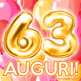 Bouquet animato di palloncini multicolori che emergono da una scatola regalo, con il numero 63 e la scritta 'Tanti Auguri!' su uno sfondo pieno di coriandoli.