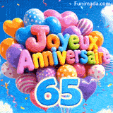 Dérivant doucement contre des nuages blancs et un ciel bleu, ce bouquet de ballons animé montre le texte Joyeux Anniversaire et le grand chiffre bleu 65.
