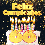 GIF animado de un pastel decorado con velas de colores, con el número 66 resaltado y un fondo brillante que transmite celebración.