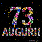 Il numero 73 e la scritta Auguri formati da gemme colorate e scintillanti su uno sfondo nero animato da piccole stelle luminose.
