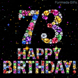 Animated glowing shiny diamonds form the number 73 and the text Happy Birthday below it, set against a black backdrop with small sparkling colored bright sparks.