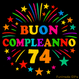 GIF animata 'Buon Compleanno 74' con lettere colorate e fuochi d'artificio