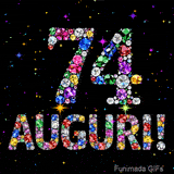 Il numero 74 e l'espressione Auguri disegnati da gioielli brillanti multicolori, circondati da piccole scintille su uno sfondo scuro.