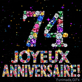 Le chiffre 74 et l'inscription Joyeux Anniversaire dessinés par des joyaux brillants multicolores, entourés de petites étincelles sur fond sombre.