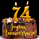 GIF animé pour un 74e anniversaire avec une élégante gâteau au chocolat, des bougies dorées formant le chiffre 74 et le texte 'Joyeux Anniversaire!' en écriture dorée.