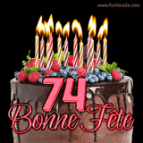 GIF animé pour un 74e anniversaire avec un somptueux gâteau au chocolat décoré de baies fraîches, des bougies allumées et le texte '74 Bonne Fête!' en rouge.