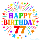 Festive 'Happy Birthday 77' animated GIF with rainbow-colored letters surrounded by fireworks and stars