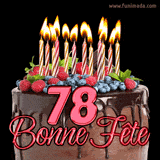 GIF animé pour un 78e anniversaire avec un somptueux gâteau au chocolat décoré de baies fraîches, des bougies allumées et le texte '78 Bonne Fête!' en rouge.