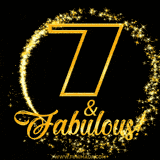 A celebratory animated graphic reads '7 & Fabulous!', rendered in sparkly gold text on a black background with starburst animations.