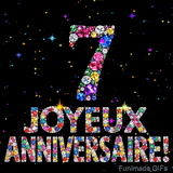 Le chiffre 7 et l'expression Joyeux Anniversaire dessinés par des pierres précieuses brillantes sur un fond noir avec de petites étoiles lumineuses.