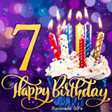 A cupcake with white frosting and burning candles next to a gold number 7. Cursive Happy Birthday is written below on a blurry purple lighted background.