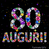 Immagine animata che mostra il numero 80 e Auguri in cristalli multicolori brillanti, circondati da piccole luci su uno sfondo scuro.