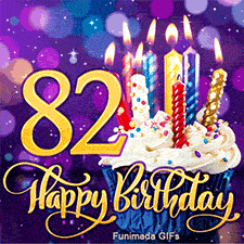 A frosted cupcake with burning candles next to a large gold number 82. Below is cursive Happy Birthday text against a sparkling purple bokeh.