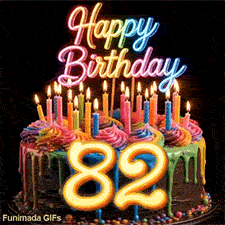 Rotating colorful cake GIF for 82nd birthday featuring lit candles, neon rainbow topper, and glowing golden number 82.