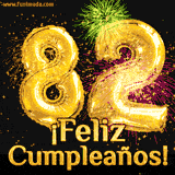 GIF animado con globos dorados en forma del número 82, acompañado de fuegos artificiales de colores y la frase '¡Feliz cumpleaños!' en letras vibrantes.