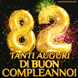 Palloncini dorati a forma del numero 82, accompagnati da scintille e fuochi d'artificio su sfondo nero, con il messaggio 'Tanti auguri di Buon Compleanno!'.
