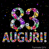 Animazione con il numero 83 e la parola Auguri creati da pietre preziose colorate, con un effetto scintillante su sfondo nero.