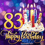 Golden number 83 and Happy Birthday script next to a cupcake with white frosting and lit candles, set against a glowing purple lighted background.