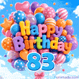 Swaying in the breeze, a large cluster of festive balloons displays the words Happy Birthday and a prominent blue digit 83 attached below.