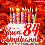 GIF animata per un 84° compleanno, Mostra una torta bianca con candeline colorate accese e coriandoli, di fronte a un muro di rose rosse, Il testo dice 'Buon 84 compleanno!'.