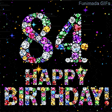 Brightly colored shiny crystals form the digit 84 and Happy Birthday lettering, positioned on a dark canvas featuring small animated twinkling bright stars.