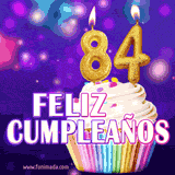 GIF animado de un cupcake decorado con confites, dos velas doradas encendidas formando el número 84, sobre un fondo púrpura brillante con destellos.