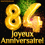 GIF animé pour un 84e anniversaire avec des ballons dorés en forme de 84, des feux d'artifice colorés et le texte 'Joyeux Anniversaire!' sur un fond noir festif.