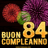 Animazione di fuochi d'artificio colorati con il numero 84 in oro brillante e la scritta 'Buon Compleanno' su uno sfondo nero festivo ed elegante.