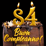 GIF animato con una torta al cioccolato decorata con crema, dettagli dorati e due candele accese che formano il numero 84. Messaggio 'Buon Compleanno' in scritta elegante.