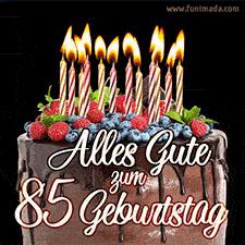 Das Geburtstags-GIF zeigt einen Schokoladenkuchen mit Beeren und Kerzen zur Feier eines 85. Geburtstags.