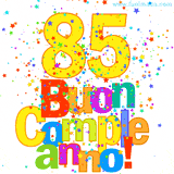 Animazione con il numero 85 in giallo e scritte multicolore 'Buon Compleanno!', accompagnate da una pioggia di stelle e coriandoli colorati.