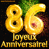 GIF animé pour un 86e anniversaire avec des ballons dorés en forme de 86, des feux d'artifice colorés et le texte 'Joyeux Anniversaire!' sur un fond noir festif.