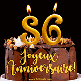 GIF animé pour un 86e anniversaire avec une élégante gâteau au chocolat, des bougies dorées formant le chiffre 86 et le texte 'Joyeux Anniversaire!' en écriture dorée.
