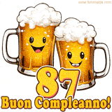 Due boccali di birra sorridenti animati, con il numero 87 e la scritta 'Buon Compleanno!' in caratteri allegri su uno sfondo bianco.