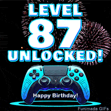 Animated GIF for a 87 birthday. The text 'Level 87 Unlocked!' and 'Happy Birthday!' are displayed over a blue video game controller with exploding fireworks in the background.