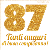 GIF animata per un 87° compleanno, Mostra il numero 87 in grandi caratteri dorati pieni di glitter scintillante, Sotto, la scritta 'Tanti auguri di buon compleanno!' in un elegante oro.