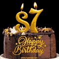 87 Birthday Chocolate Cake with Gold Glitter Number 87 Candles (GIF)