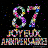 Le chiffre 87 et l'expression Joyeux Anniversaire dessinés par des pierres précieuses brillantes sur un fond noir avec de petites étoiles lumineuses.