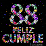 La frase FELIZ CUMPLE y el número 88 están estructurados con relucientes gemas de muchos colores, descansando en un fondo negro estrellado.