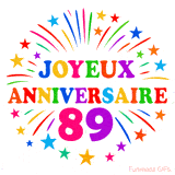 GIF animé joyeux anniversaire 89 ans avec étoiles multicolores et feu d’artifice