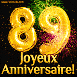 GIF animé pour un 89e anniversaire avec des ballons dorés en forme de 89, des feux d'artifice colorés et le texte 'Joyeux Anniversaire!' sur un fond noir festif.