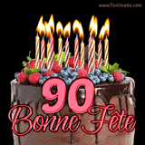 GIF animé pour un 90e anniversaire avec un somptueux gâteau au chocolat décoré de baies fraîches, des bougies allumées et le texte '90 Bonne Fête!' en rouge.