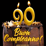 GIF animato con una torta al cioccolato decorata con crema, dettagli dorati e due candele accese che formano il numero 90. Messaggio 'Buon Compleanno' in scritta elegante.