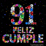 El número 91 y el texto FELIZ CUMPLE están integrados por gemas brillantes de múltiples colores sobre un fondo negro con estrellas de luz.